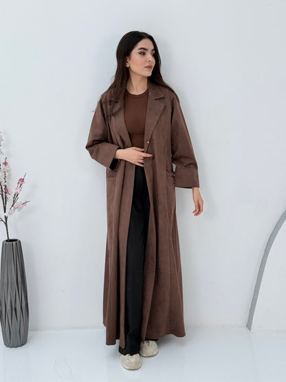 Woman wearing a Premium Cocoa Brown Shamwa Coat Abaya on a white background