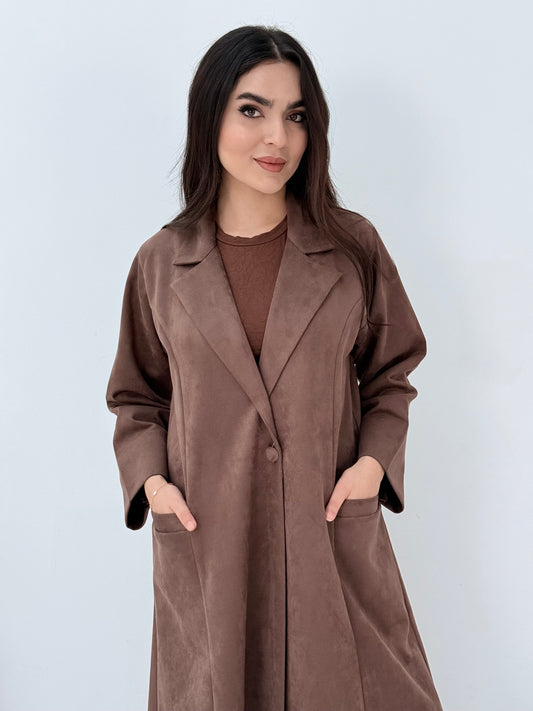 Woman wearing a Premium Cocoa Brown Shamwa Coat Abaya on a white background