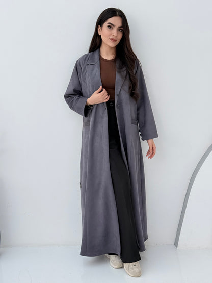 Woman wearing a Premium steel grey Shamwa Coat Abaya on a white background