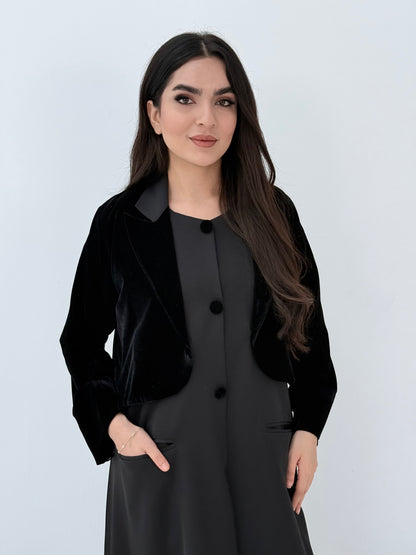 Person wearing a Black Dual-Texture Abaya on a white background
