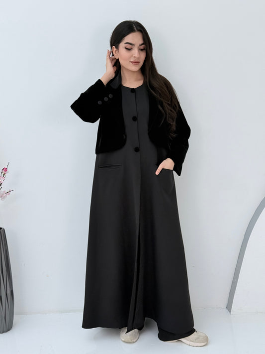 Person wearing a Black Dual-Texture Abaya on a white background