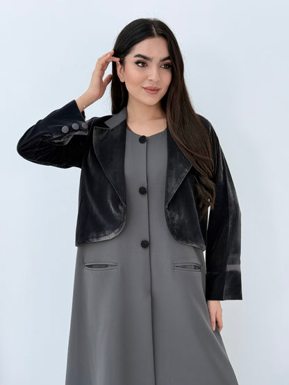 Person wearing a light grey Dual-Texture Abaya on a white background