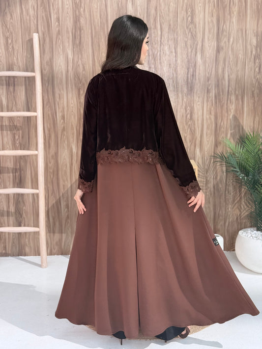 Woman in a Premium brown velvet Crepe and Velvet abaya on a wooden background