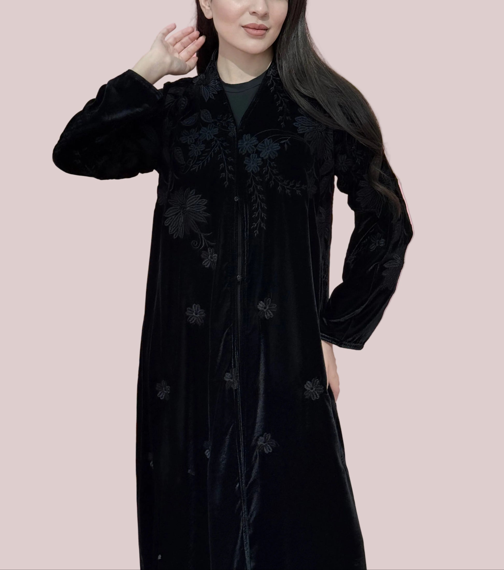 premium Black velvet coat abaya with floral embroidery on a pink background