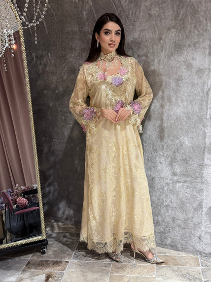 Woman in a long, elegant Cream Floral Lace Luxury Kaftan dress standing in front of a mirror.