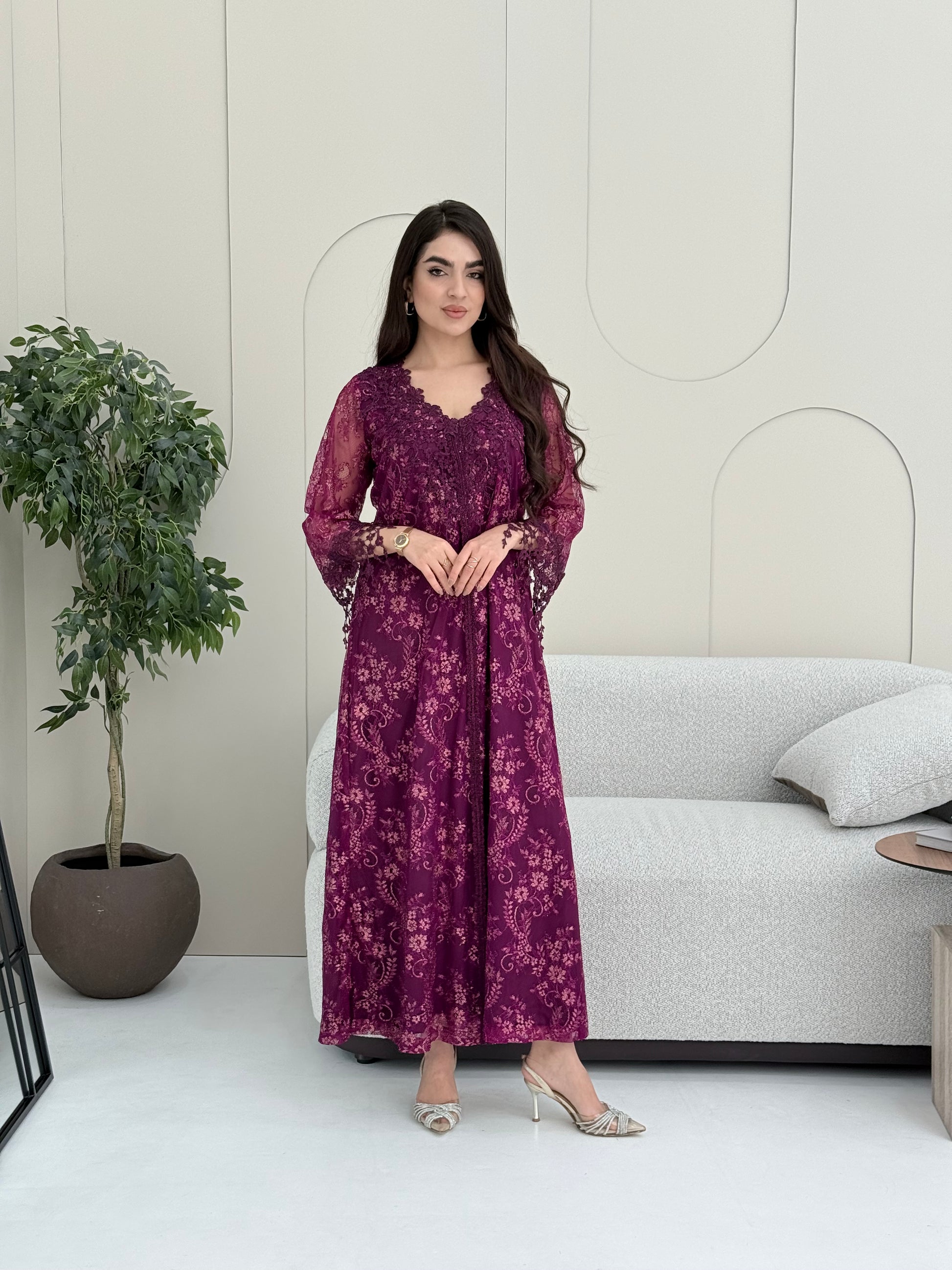 A deep purple floral lace kaftan, perfect for Eid, ceremonies, and luxury occasions