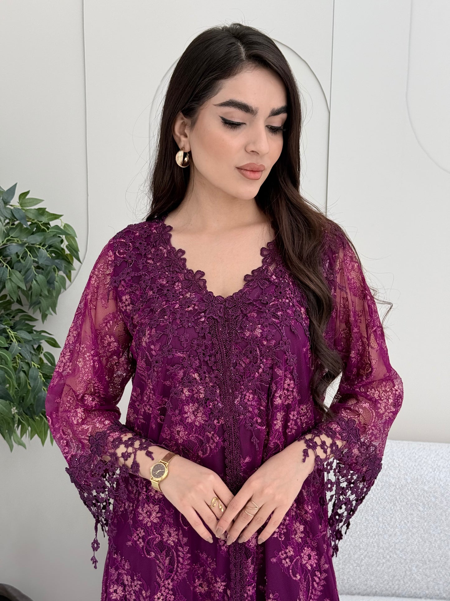 A deep purple floral lace kaftan, perfect for Eid, ceremonies, and luxury occasions