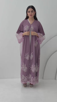 A lavender purple embroidery nida abaya, a very comfortable abaya for gatherings.