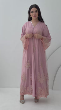 A dusty pink embroidery nida abaya, a very comfortable abaya for gatherings.