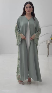 A mint green abaya, this luxurious piece is made of lace/dantel with a premium Nida fabric, this abaya is perfect for engagement and daytime weddings.