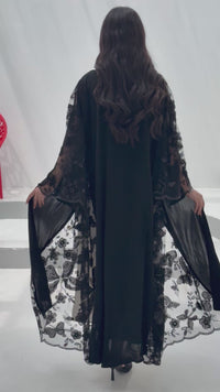 A back abaya, made of premium dantel (lace) and nida fabric, this abaya is perfect for Eid and parties.