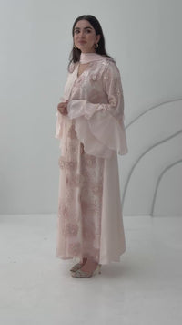 A luxurious light pink abaya with chiffon and texture of Black floral lace. This abaya is perfect for evening outings and occasions.