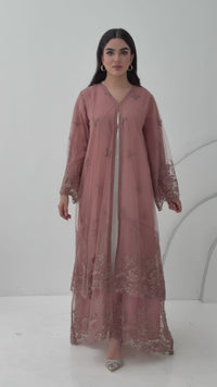 A stunning chiffon dusty pink abaya, that features floral lace on the sleeves. Its perfect for weddings or heena, daytime occasions and for formal events.