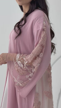A baby pink abaya, this luxurious piece is made of lace/dantel with a premium Nida fabric, this abaya is perfect for engagement and daytime weddings.
