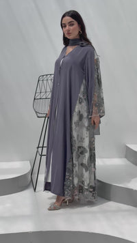 A dark grey abaya, made of premium dantel (lace) and nida fabric, this abaya is perfect for Eid and parties.