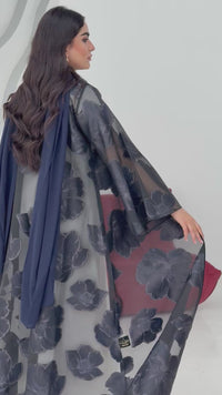 A navy blue floral abaya crafted from organza and lace fabric. Perfect choice for events.